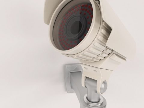 close-up-surveillance-camera-wall