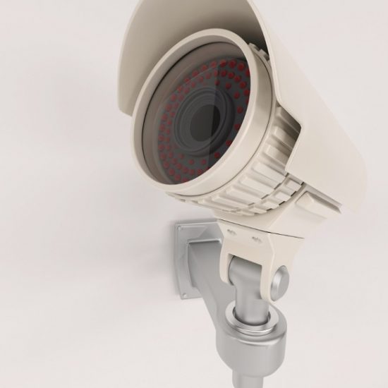 close-up-surveillance-camera-wall